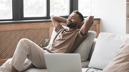 a man relaxing on a couch