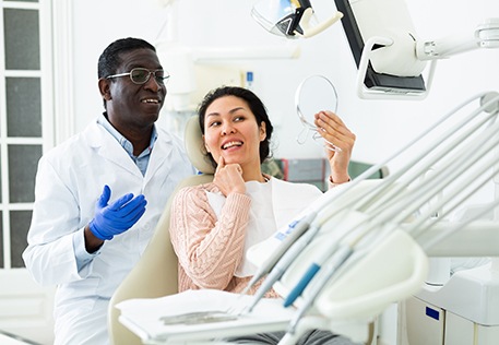 Woman smiling in the dental chair