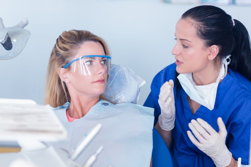 patient learning about whether root canals cause cancer