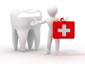 Featureless white figure gesturing to large model tooth holding red emergency kit